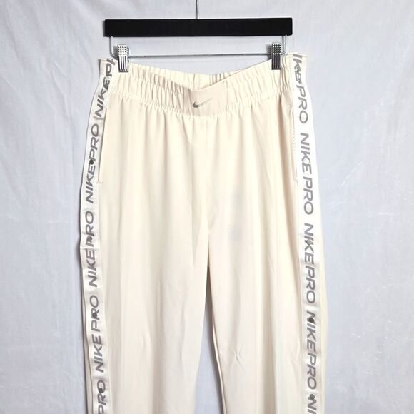 NWT..NIKE PRO.. cream tear away pants.. - Picture 1 of 15